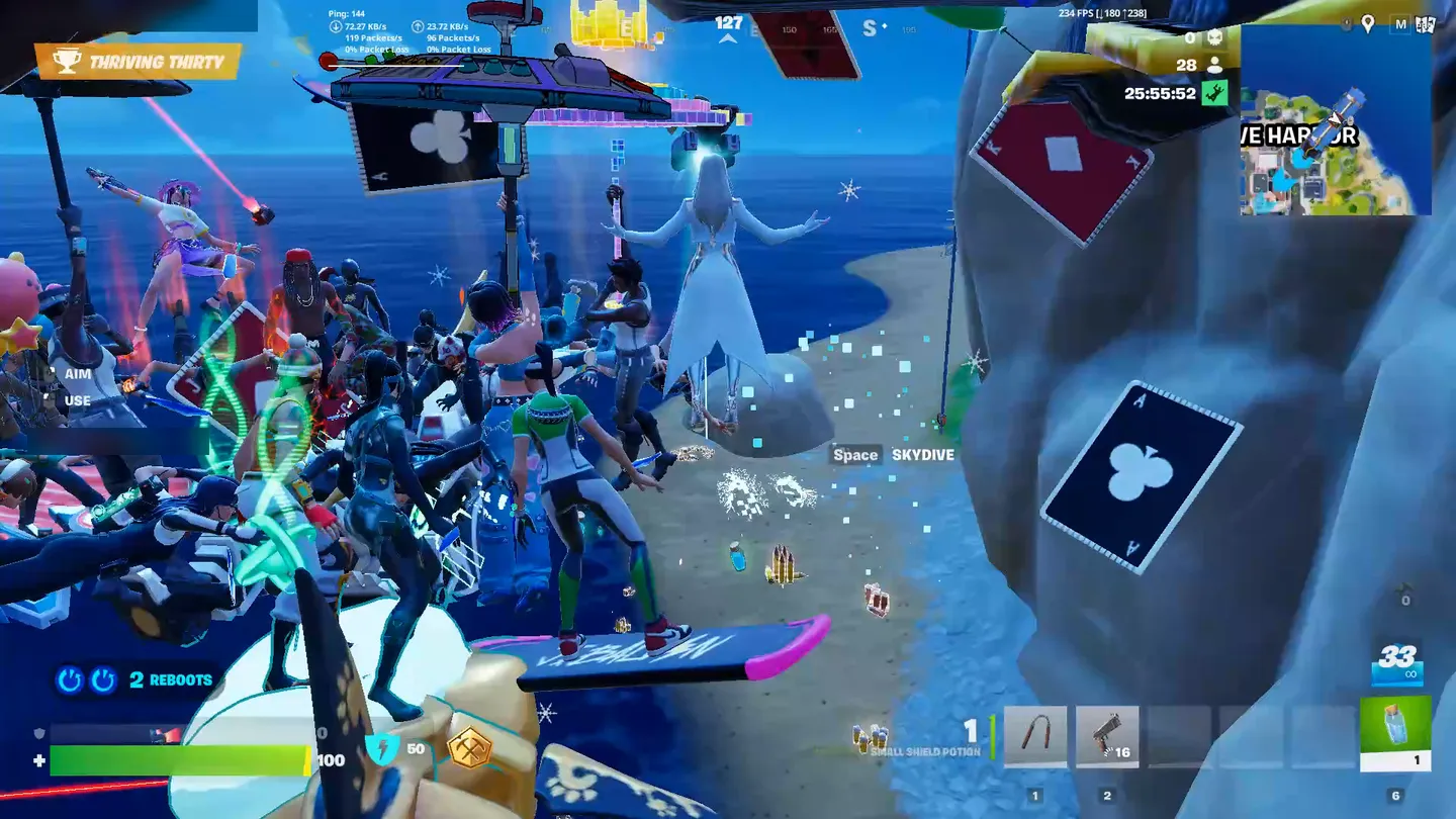 Spieler hängen immer noch in der Luft direkt über dem Strand, der Battle Bus über ihnen
